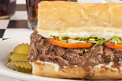 Acme 10 napkin roast beef po boy from Acme Oyster House